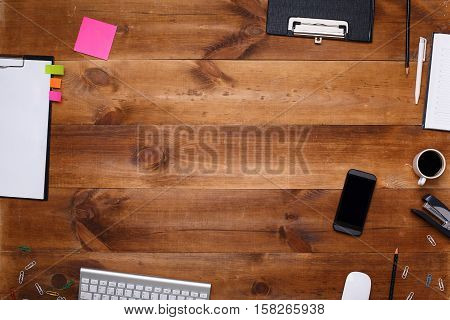 Post blog social media. View from above with copy space. Background for banner template layout mockup.Brown wooden office table, top view on workplace.