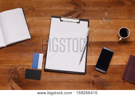 Post blog social media. View from above with copy space. Background for banner template layout mockup.Brown wooden office table, top view on workplace.