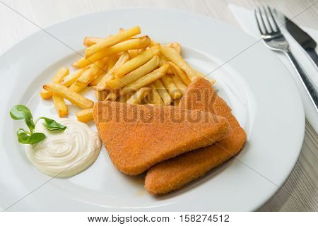 Fried cheese with french fries and tartar sauce
