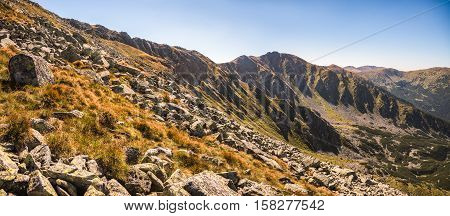 Panoramic View of Mountain Landscape on Sunny Day with Rocks in Foreground. Mount Derese Low Tatras Mountain Slovakia.