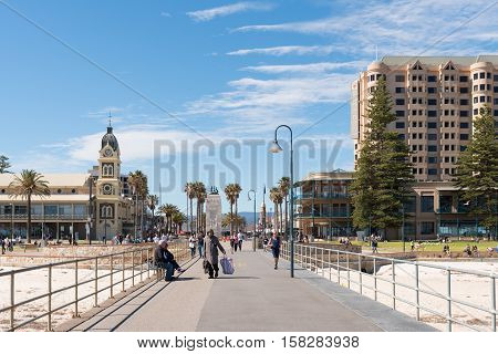 Adelaide Australia - August 28 2016: Tourists and locals at the beautiful Adelaide beachside suburb of Glenelg