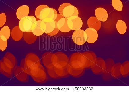 Abstract colorful blurry background cold and warm colors tone cinematic effect evening night street romantic lights