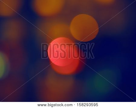 Abstract colorful blurry background cold and warm colors tone cinematic effect evening night street romantic lights