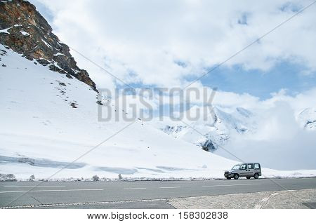 INNSBRUCK, AUSTRIA - MAY 2, 2015: A car driving through the road in Grossglockner mountain.