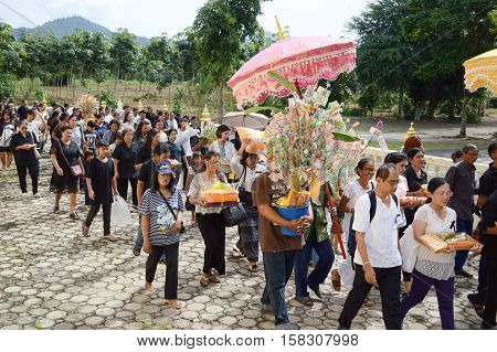 RAYONG, THAILAND, NOVEMBER 6: A traditional Buddhist ceremony, Kathin, held at Wat Huytubmon