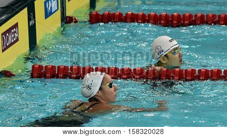 Hong Kong China - Oct 29 2016. Olympian swimmer Evelyn VERRASZTO (HUN) and CHEN Szu-Chi (TPE) after finishing 200m backstroke. FINA Swimming World Cup Preliminary Heats Victoria Park Swimming Pool.