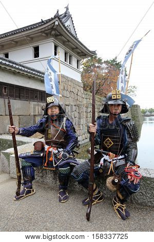 KAGAWA, JAPAN - NOVEMBER 20: Ancient firelock rifle fighters at Marugame Historical battle Festival, event dedicated to Japanese culture and tradition at Marugame-castle on November 20, 2016 in Japan.