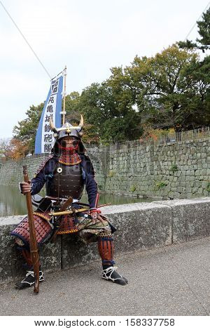 KAGAWA, JAPAN - NOVEMBER 20: Ancient firelock rifle fighters at Marugame Historical battle Festival, event dedicated to Japanese culture and tradition at Marugame-castle on November 20, 2016 in Japan.