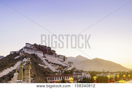 A building in Potala palace, Lhasa, Tibet. Lhasa in morning mist, Potala monastery. 
Soft focus due to long exposure