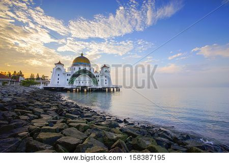 Dramatic sky & reflections at Straits Mosque Malacca. Nature composition