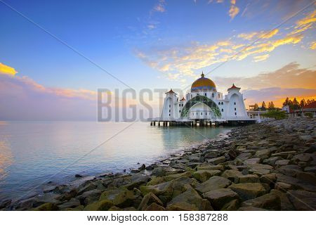 Dramatic sky & reflections at Straits Mosque Malacca. Nature composition