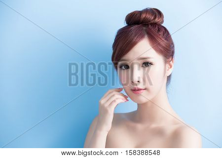 beauty skin care woman smile to you isolated on bluebackground asian