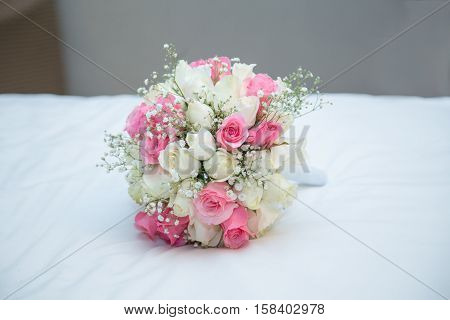 White and pink roses wedding flower bouquet