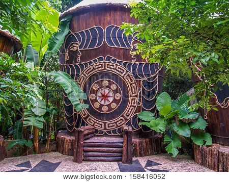 Traditional painting on a wooden column of miao tribe Hainan, China