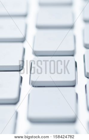 Macro shot of a computer keyboard key with bokeh effect. Selective focus