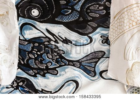 abstract black fish pattern on white cloth