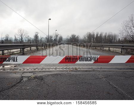 Local Police line (Polizia Municipale in Italian) do not cross. Bridge access blocked for flood risk
