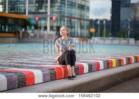 Girl Walking At La Defense In Paris