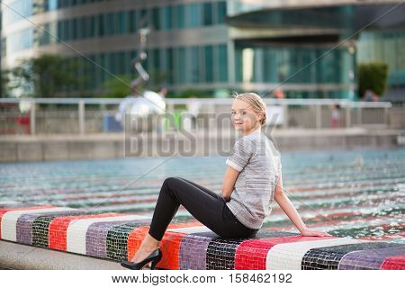 Girl Walking At La Defense In Paris