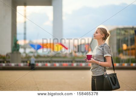 Girl Walking At La Defense In Paris