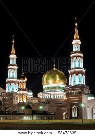 Moscow Cathedral Mosque. Night Photography. Beautiful light golden domes.