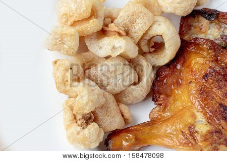 Streaky Pork With Crispy Crackling And Grilled Chicken Leg Ioslated On White Background Close-up. Ho