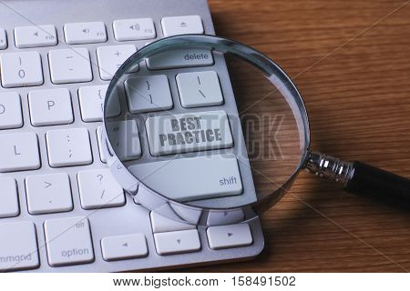 Computer keyboard with BEST PRACTICE button .