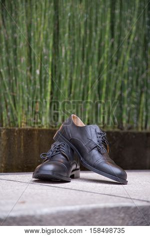 Groom's shoes black on a wedding day. Wedding detail
