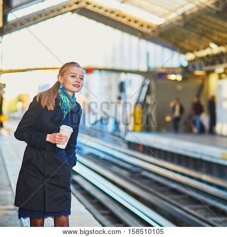 Beautiful Young Woman Waiting For A Train
