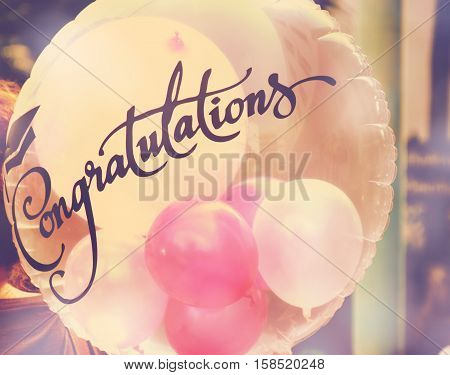congratulations bolloon with vintage filter colorful background