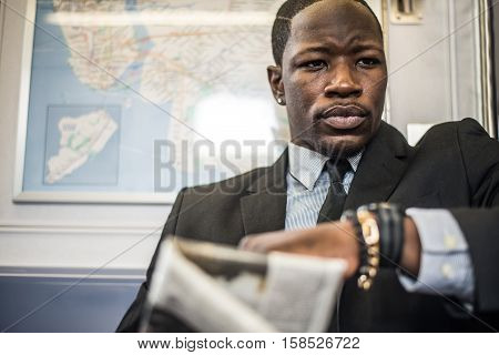 Businessman in full suit in New York subway metro