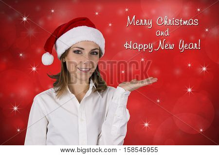 Christmas Woman. Beautiful fashion model with hat Santa Claus.