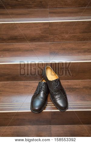 Groom's shoes black on a wedding day. Wedding detail