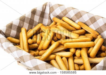 Crispy bread sticks with salt and spices. Studio Photo