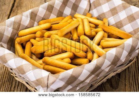 Crispy bread sticks with salt and spices. Studio Photo