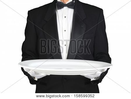 Waiter holding a large white platter over white. Horizontal format, man is unrecognizable.