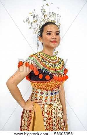 Labuan,Malaysia-Nov 26,2016:Lady from the Iban ethnic of Sarawak Borneo in traditional costume during Borneo festival in Labuan.The Iban community lived in longhouses located in Sarawak,Malaysia.