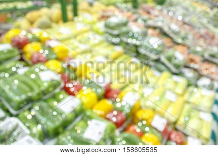 Mixed vegetables displayed inside supermarket. Sale, promo