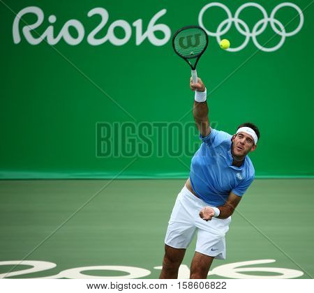 RIO DE JANEIRO, BRAZIL - AUGUST 11, 2016: Grand Slam champion Juan Martin Del Potro of Argentina in action during his quarterfinal match of the Rio 2016 Olympic Games at the Olympic Tennis Centre