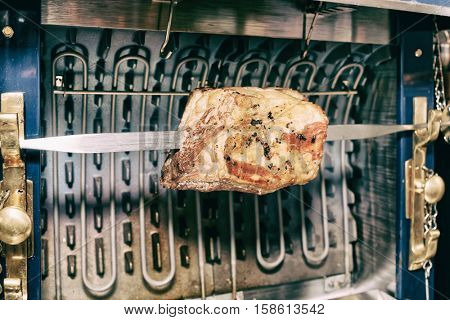 Pork ribs cut on old style electric grill, toned image