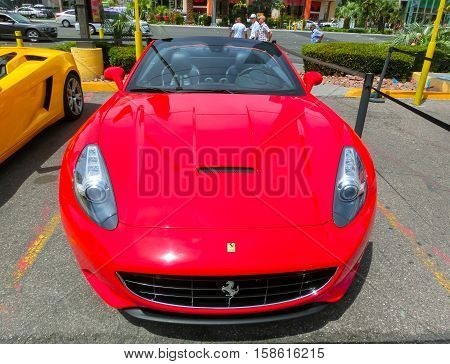 Las Vegas, United States of America - May 05, 2016: Luxurious and Colorful Cars for Rent Waiting in the Parking Lot of a Supermarket on the Las Vagas Strip, Nevada on May 05, 2016