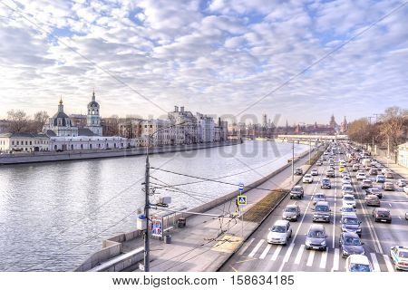 MOSCOW RUSSIA - November 22.2014: Moskva river and the road on the Moskvoretskaya Embankment of the side Kremlin