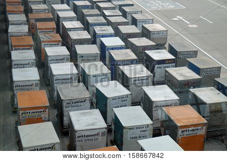DELHI, INDIA - FEBRUARY 19: Top view of containers cargo truck on the ground in the Delhi airport on February 19, 2016. Indira Gandhi International Airport is the 32th busiest in the world.