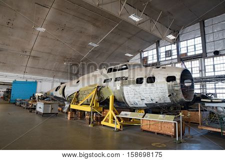 DAYTON, OHIO, USA - NOVEMBER 18, 2016: National Museum USAF is restoring WWII The Swoose B-17D Flying Fortress bomber the oldest B-17 & only D model in existence. Shown here in the restoration hanger.