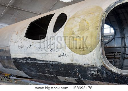 DAYTON, OHIO, USA - NOVEMBER 18, 2016: National Museum USAF is restoring WWII The Swoose Flying Fortress bomber, the oldest B-17 & only D model in existence. Shown here with crews' names on fuselage.