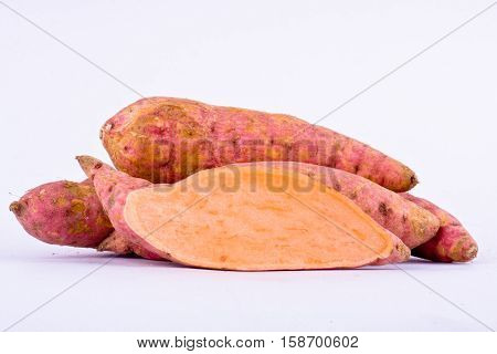 fresh sweet potato yam on white background healthy fruit food isolated