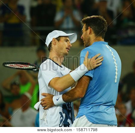RIO DE JANEIRO, BRAZIL - AUGUST 14, 2016: Juan Martin Del Potro (R) congratulates Olympic champion Andy Murray of Great Britain with his victory at men's singles final of the Rio 2016 Olympic Games