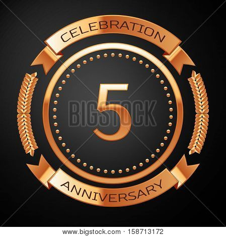 Five years anniversary celebration with golden ring and ribbon.