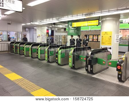 TOKYO, JAPAN - 19 November 2016: Gate of Suidobashi Railway Station. Subway system is one of the most important public transportation in Tokyo.