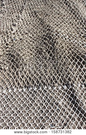Some fishing nets stretched in a port